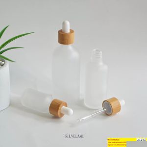 Förpackningsflaskor grossist 5 ml 15 ml 30 ml 50 ml 100 ml frostat glas eterisk olje droppare med naturliga bambu kepsar tomma kosmetiska dro dhtfe