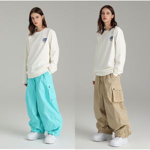 スキービブパンツの男性と女性ゆるい防水防風スノーボードパンツスキー服パンツ屋外冬のスノーボードキャンプズボン230922