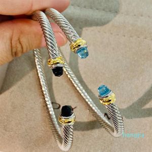 Bangle Cable Classic Collection Armband med Blue Topaz och Black Onyx 18K Yellow Gold245C