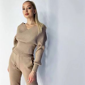 Tracksuits Womens Tracksuit Sexig spårdräkt Tvådel kostym Stickad Sport som kör kvinnor Autumn Temperament Is Thin Wears Out Sports Fashion Suit