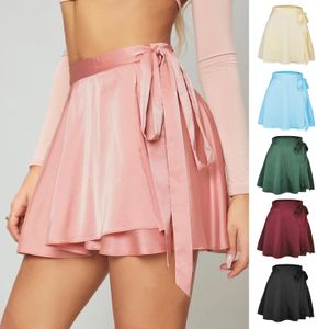 Kjolar kawaii mini kjol solid färgkvalitet hög midja mode fluga slips spetsning kort chiffong satin söt wrap kvinnkläder 230923