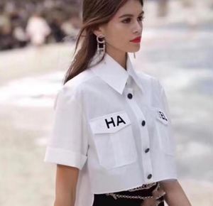 Nuove camicette larghe da donna firmate in stile classico francese Camicie cchannel di lunghezza corta Camicie bianche stampate alla moda di moda estiva parigina