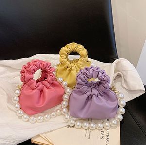 Mini baby crossbody handväska flickor prinsessa axelväskor barn pärlväska