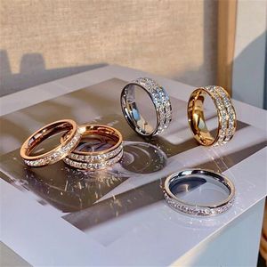 2021 Anello nuziale di vendita superiore Scintillante Gioielli di lusso Acciaio inossidabile Alta qualità Oro rosa Riempimento Cristallo Festa Donna Uomo Engagemen302W