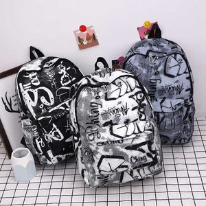 Neue Junior High School Schüler Schultasche Personalisierter Brief Graffiti Rucksack Große Kapazität Paar Rucksack Reise Tragetasche Tide 230815