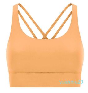 Mujer soporte medio a prueba de golpes Push Up Yoga Athletic Fitness Bra Crop Top diseñador