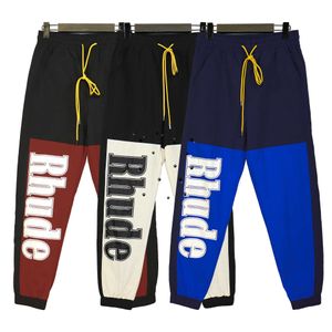 Leggings casual da uomo con stampa di lettere di moda di strada americana, pannello a contrasto, tendenza hip-hop