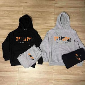 TRACJSUT TRAPSTAR BRAND DREPIDED SPORTSWear Męskie koszule 16 kolorów ciepłe dwa kawałki Ustaw luźne bluzy bluzy bluzy jogging prąd 662ess