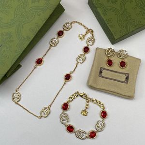 Golden Ruby Brass Earrings Bracelet Neck Jewelry مجموعة أزياء العلامة التجارية سوار مصمم الأزياء