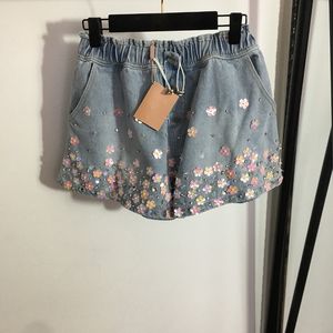 Blomma paljett shorts byxor kvinnor diamant shorts klassisk elastisk charm shorts flickor härliga designer jeans byxor kläder