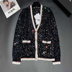 Kvinnors stickor Tees Designer 2023 Autumn/Winter New Slouchy Loose V-Neck Full Sky Star Colorful Pärled Hollow Sticked Cardigan Coat for Women CSWN