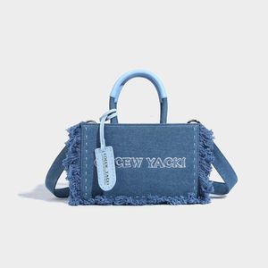 Mini denim püskül tote çanta yeni stil crossbody çanta kadın cocew çok yönlü lüks çantalar moda omuz çantası alışveriş çantası 230928