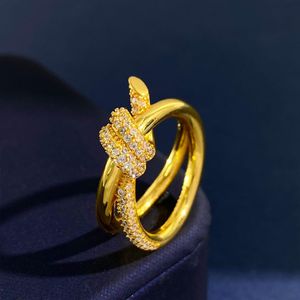 Nytt ankomst rostfritt stål rosguld kärlek dubbel knut ring för kvinna kristall smycken ringar män bröllopslöfte ringer kvinnliga kvinnor 202n
