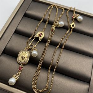 Nya designade dödskallar hängande korthängen kvinnors halsband damer vintage mässing pärlhalsband designer smycken 031252s