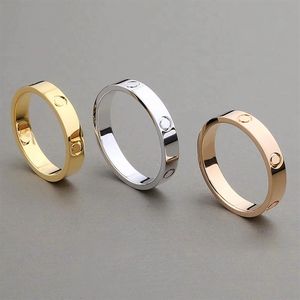 Moda tasarımcı yüzüğü klasik paslanmaz çelik takılar altın aşk evli nişan çifti kadınlar için men313l