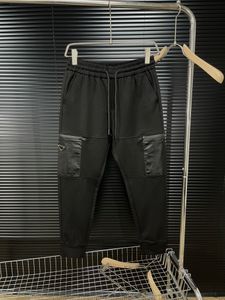 Pantaloni firmati di lusso primaverili e autunnali eleganti cuciture tascabili dal design bello pantaloni cargo neri pantaloni da uomo delle migliori marche di alta qualità