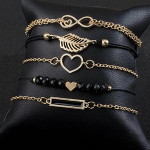 PCS Set Love Heart Infinity Symbol Charm Armband för Woman Gold Link Chain Hollow Feather Black Beads Braclet Girl299J