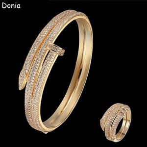 Donia Jewelry Luxury Bangle nagel Överdriven titanstålarmband Mikroinmatad färgad Zircon European och American Fashion DES252W