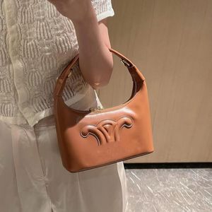 2023 Novo designer feminino da primavera Designer de sacolas de travesseiros Senhoras simbole jacquard Fabric Luxuado Contraste Couro Moda Handy ombros de bolsa