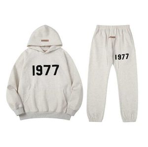 Herr- och kvinnors hoodies Sweatshirts 2023 modevarumärke Essentail Ny stil säsong 8 flockade leggings set par 1977 FS04