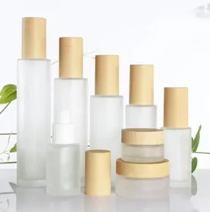 50st Frosted Glass Cosmetic Jar Bottle Face Cream Pot Lotion Spray Pump flaskor med plastimitation Bambu lock 30 ml 40 ml 60 ml 80 ml 100 ml grossist