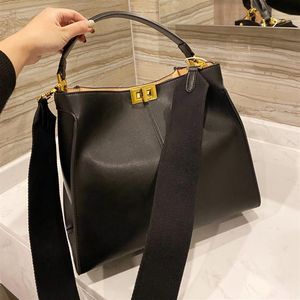 Kvinnor Luxurys handväska handväska äkta läder axelpåsar designers lady shop tote väska klassisk spin lås borttagbar bred remstorlek258u