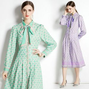Kvinnor boutique kl￤nning l￥ng￤rmad tryckt kl￤nning 2023 v￥rens h￶stskjorta kl￤nning av high-end trendig lady bow kl￤nningar ol kl￤nningar