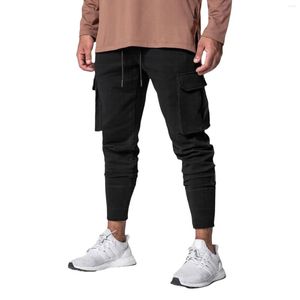 Herrbyxor män mode jogger fast färg lätta stora fickor dragskon elastisk midja byxor hösten casual tröjor