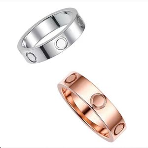 Einfache Legierung Liebesringe Designer Ringpaar Hochzeitszubehör Kristall Engagement Gold plattiert nicht allergisch Luxusbrief Männer Frauen Diamond Band Ring