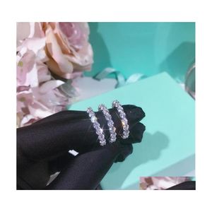 Обручальные кольца Infinity Brand Fashion Ювелирные изделия 925 стерлинговый круглый стек белый топаз CZ Diamond Gemstones Женщины свадебное кольцо Gi Dhwgy