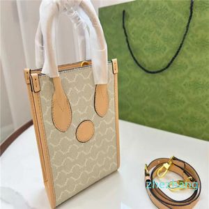 Mini-Einkaufstasche für Damen in cremeweißem Ton, klassische Goldtönung, Accessoires in Milchtee-Farbe, elegante, frische, charmante Umhängetasche, Umhängetaschen, Handtaschen