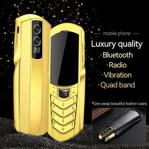 Luxury Golden Business Cell Phone Unlocked 2G GSM Dual Sim Card Mobile Phones Rostfritt stål Body Mp3 Bluetooth Dial Camera Magic Voice Cellphone