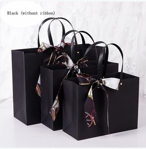 Kraft Paper Shopping Jewelry Boxes Party Wedding Favor Merchandising Sacchi al dettaglio sacchetti regalo di carta nera con manici Bulk
