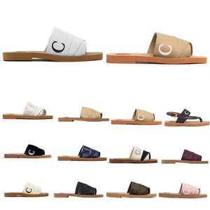 Kvinnor Woody tofflor Summer Rubber Sandals Beach Sliders Scuffs Inomhusskor Designer Canvas Cross Woven Outdoor Peep Toe Slipper Letter Stylies Shoes
