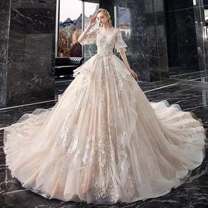 African Dubai Elegant Long Sleeves A-Line Wedding Dresses Sheer Crew Neck Lace Appliques Beaded Vestios De Novia Bridal Gowns with Buttons Plus Size dress white