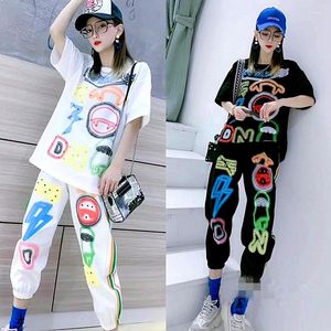 Kvinnors träningsdräkter Summer Loose 2 Pieces Women's Cool Graffiti Print Twinsets Tees Bluses Tops och Casual Capris Pants Suits NS999