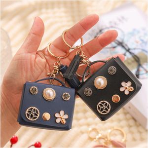 Key Rings Leather Keyrings Coin Purses Wallet Chains Accessories Tassel Earphone Holder Car Keychains Designer Women Fashion Pu Pend Dhic8