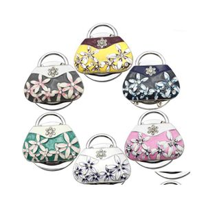 Hooks Rails 1Pc Hanger Hook Metal Holder Porcelain Folding Handbag Purse Bag Table Portable Fashion Unique1 Drop Delivery Home Gar Dhtkg