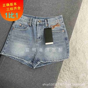Jeans feminino Designer de verão de vegetação de bolso co-marcador bordado tigre de jeans de cintura alta shorts slim fit pica
