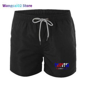 Men's Shorts Mens Designer Brand Trapstar Water Sports Shorts Summer Print Men Surf Beach Shorts Mesh Lining Swimwear 2022 Fashion Bermuda Shorts 011023H