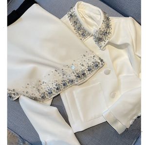 Kvinnors stickor Tees kjol S Autumn Elegant White Classic Style Two Piece Suit Jacket Mini Kirt Conneuntos de Falda 230110