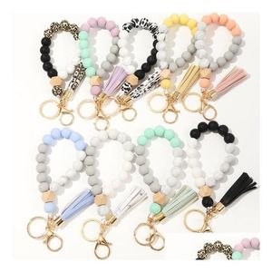 Keychains Lanyards 9 Colors Wooden Tassel Bead String Bracelet Keychain Food Grade Sile Beads Bracelets Women Girl Keyring Wrist S Dhuka