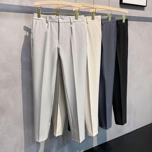 Calça de calça masculina Calça de nove pontos masculinos 2023 Seção fina de tendência pendente solta