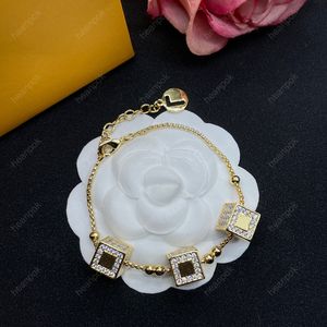 Pulseira de designer de luxo corrente de ouro diamante amor pulseiras f para homens moda feminina carta cubo pingente casamento jóias acessórios caixa