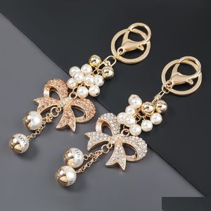 Key Rings Alloy Crystal Cute Bow Imitation Pearls Flower Ring Car Chain Girl Bag Pendant With Accessories Best Gift Jewelry Drop Deli Dhh9X