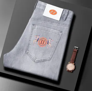 Luz de luxo europeu moda masculina jeans estiramento casual fino ajuste calças magras impresso primavera e verão novo