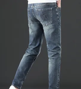 Hosen Herren schlanker gerade Herbst- und Winter- und Winter-Dicke-Jeans High-End European MENS Dehnen klassische Stickerei