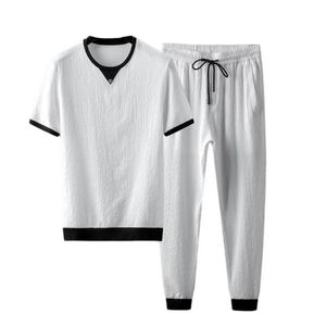 Herrespår. Set 1 män tee svett absorption super mjuk polyester enkla dragkammar byxor jogger kostymer för träningsmän