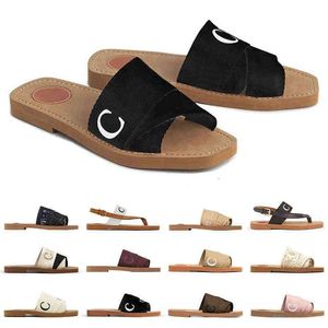 2023 Nya modekvinnor tofflor Sommargummi Sandaler Beach Sliders Scuffs inomhusskor Designer Canvas Cross Woven Outdoor Peep Toe Woody Casual Slipper