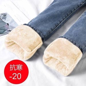 Kvinnors jeans Kvinnors förtjockade plysch denim byxor höst och vinterstil hög midja elastisk tät tunn varm bärande penna fötter